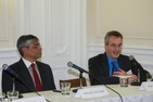 Dean James Goldgeier speaks during the program as the Embassy of India's Deputy Chief of Mission Arun Singh looks on.

